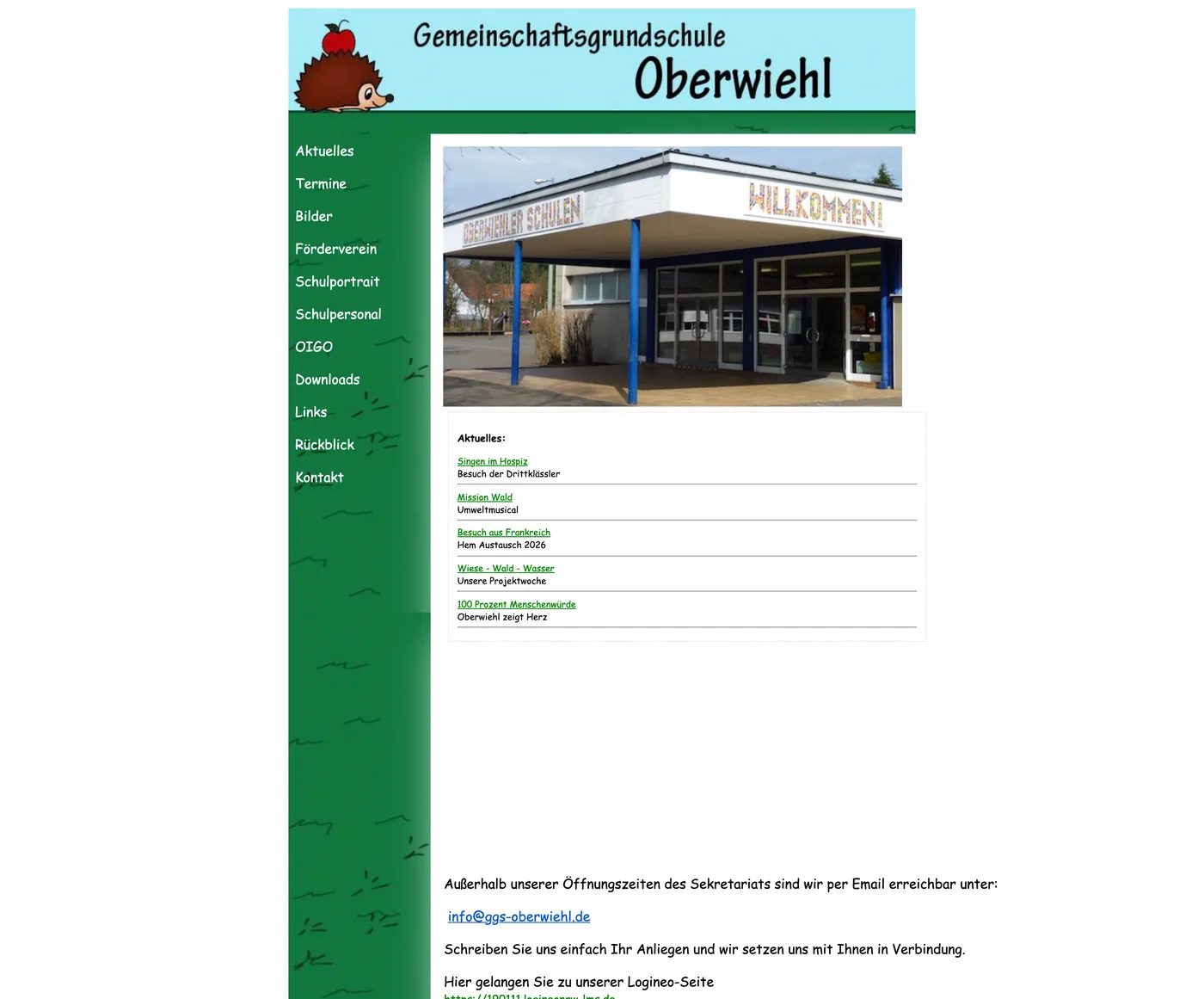 Die frühere Website der GGS Oberwiehl als feste Tabelle mit Igel im Kopfbild, elf Menüpunkten in Comic Sans und einer Liste mit Neuigkeiten